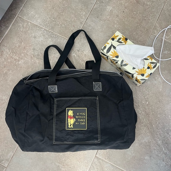 Disney Handbags - Disney Winnie the Pooh Black tote bag with Pooh Label